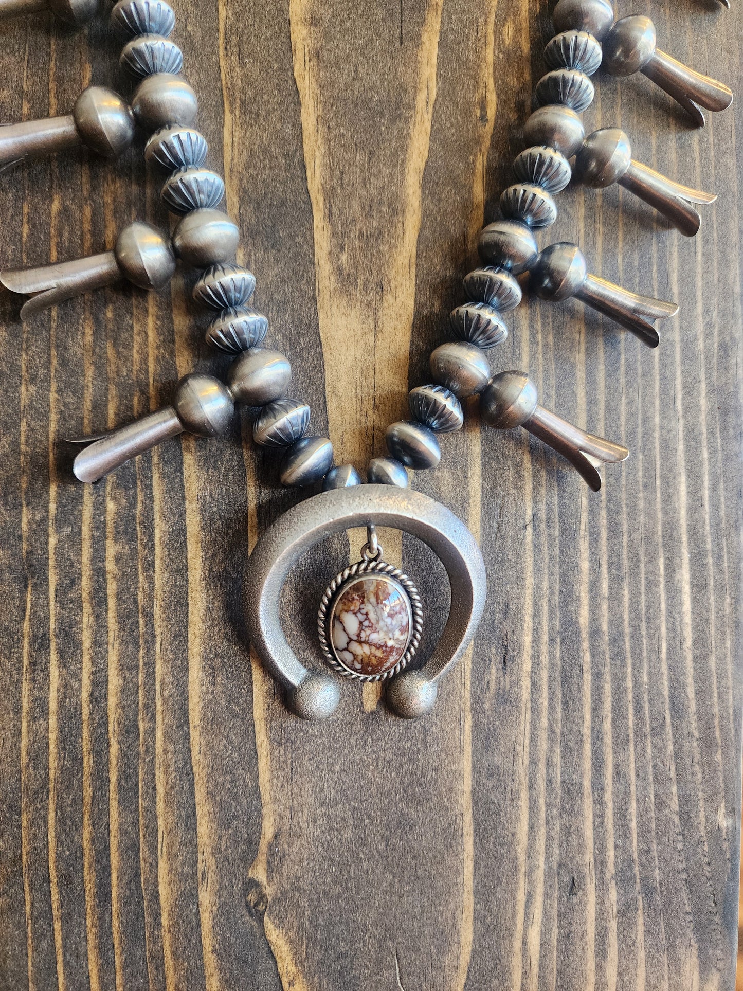 Sterling Silver Squash Blossom with Sandcast Wild Horse Naja