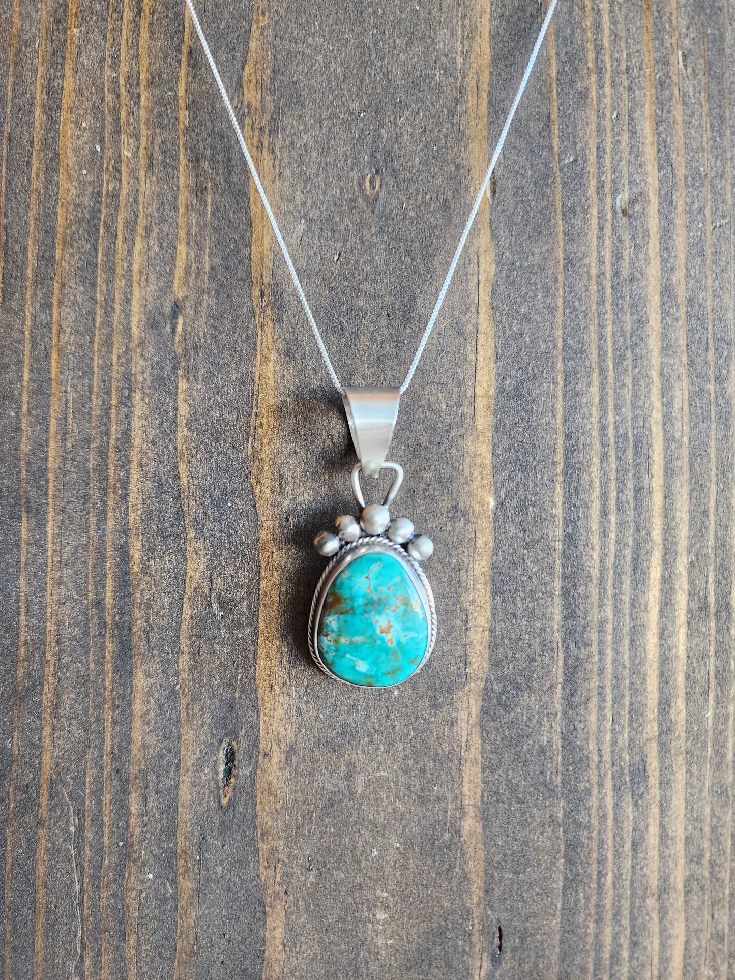 Kingman Turquoise Pendant Necklace with Sterling Silver Embellishment