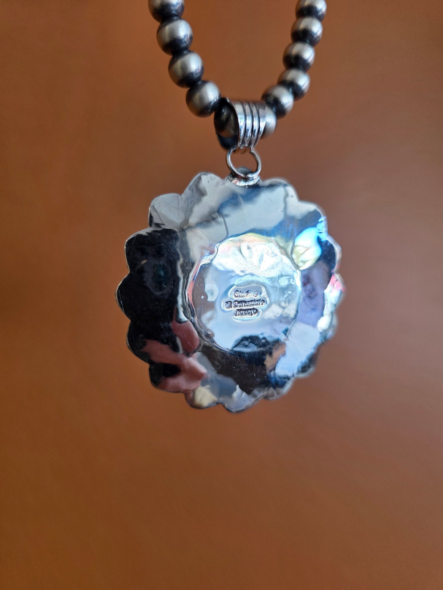 Navajo Stamped Sterling Silver Sunface Pendant