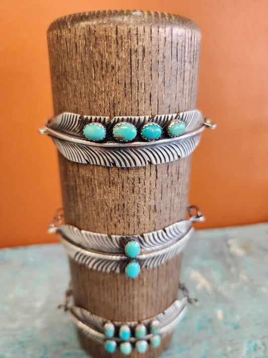 Sterling Silver Feather Cuff w/Single Row Turquoise accent