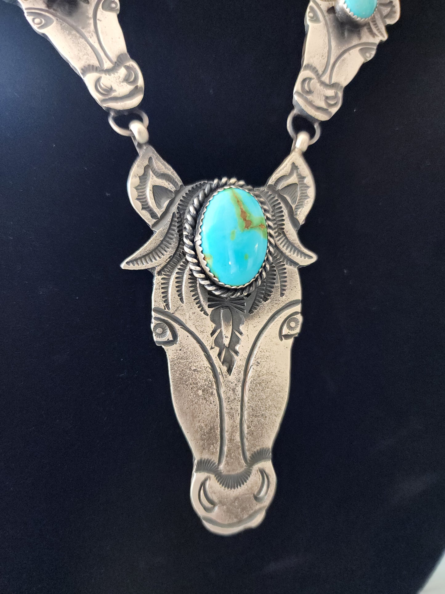 Expertly Crafted Sandcast and Sonoran Gold Turquoise Horse Set