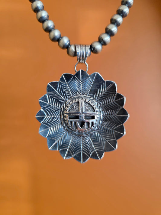 Navajo Stamped Sterling Silver Sunface Pendant