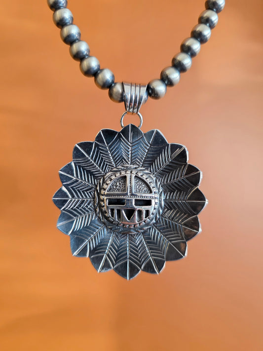 Navajo Stamped Sterling Silver Sunface Pendant