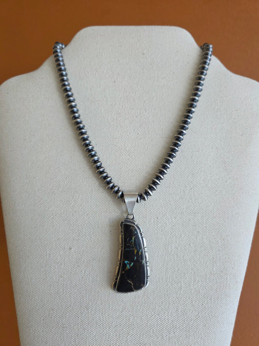 Begay Oblong Blackjack Turquoise Pendant
