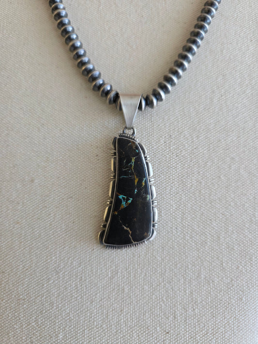 Begay Oblong Blackjack Turquoise Pendant