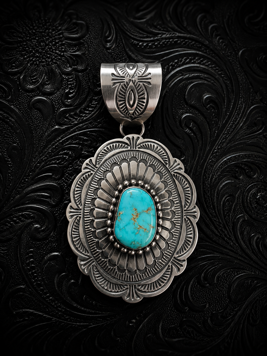 Arnold Blackgoat Lone Mountain Turquoise Stamped Sterling Concho Pendant